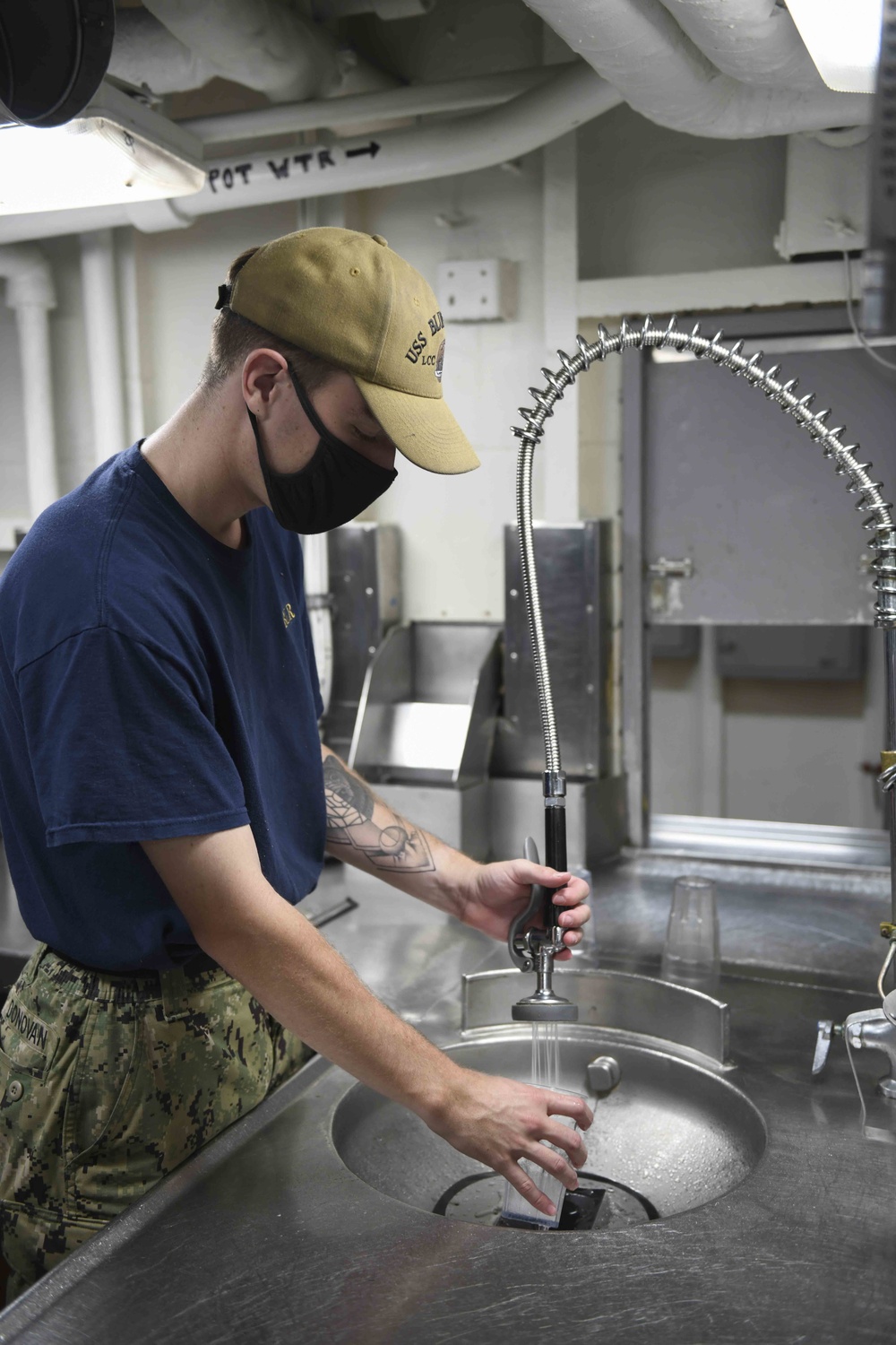 Food Service Assistants Clean Dishes