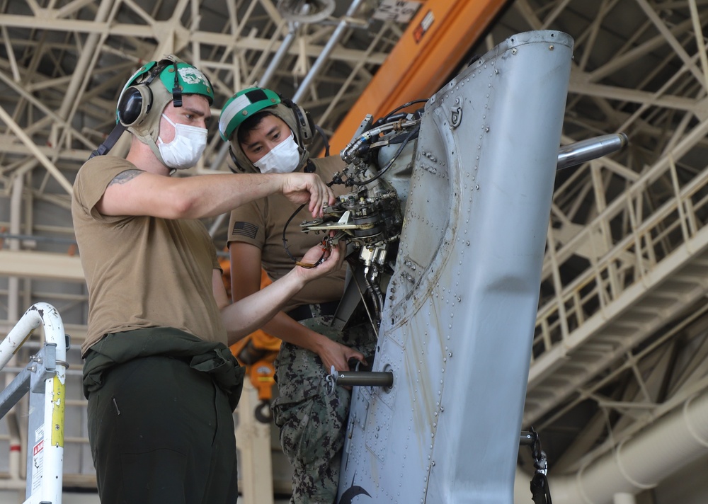 HSM-51 Maintenance Personnel Perform Routine Maintanance at NAF Atsugi