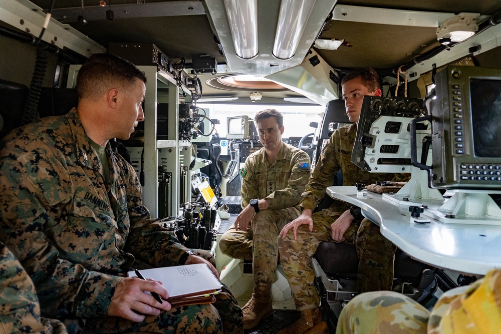 Learning from our partners - U.S. Marines walk through Australian command and control vehicle