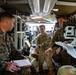 Learning from our partners - U.S. Marines walk through Australian command and control vehicle