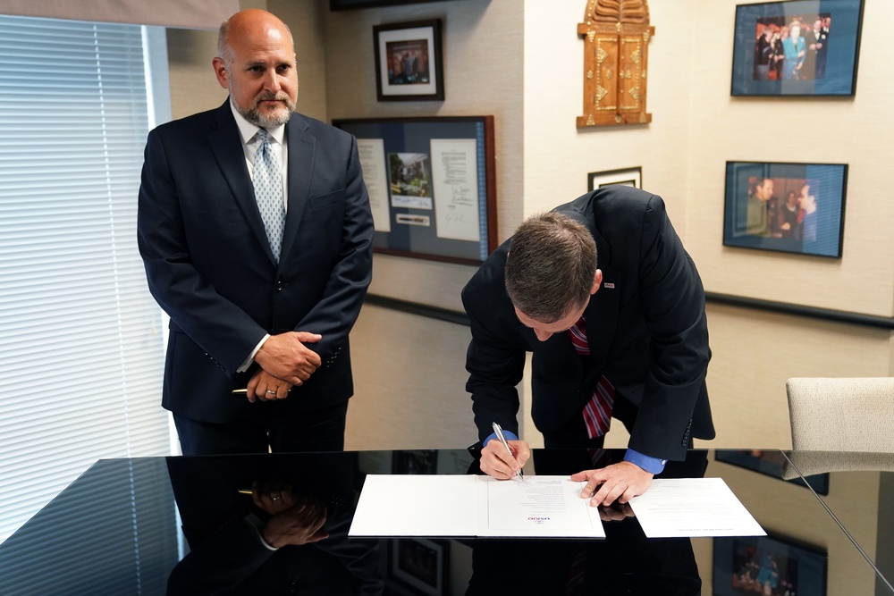 Acting AAID John Barsa is sworn into office