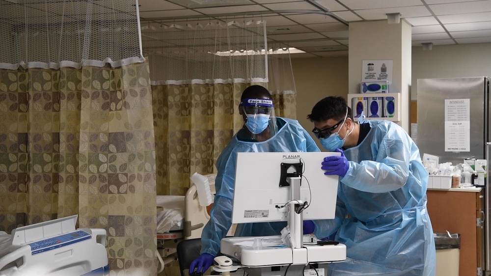 Soldiers provide medical support at Valley Baptist Medical Center, Harlingen, Texas