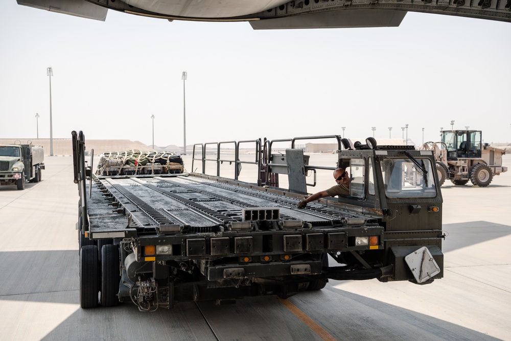 8th EAMS members offload NPC-Lite from C-17 Globemaster III