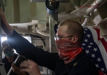 USS Ralph Johnson Sailors Conduct Weapons Maintenance