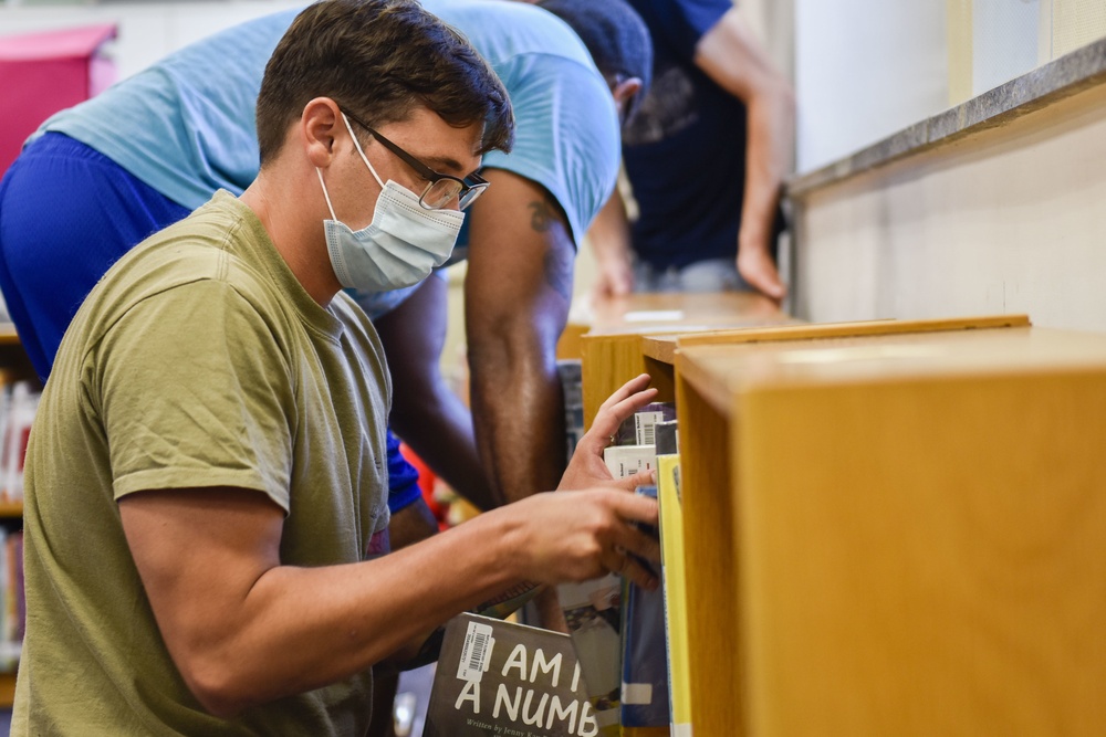 Volunteers Onboard NSA Naples Prepare Schools for Physical Distancing