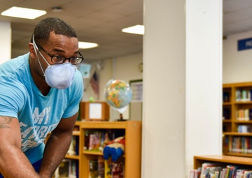 Volunteers Onboard NSA Naples Prepare Schools for Physical Distancing