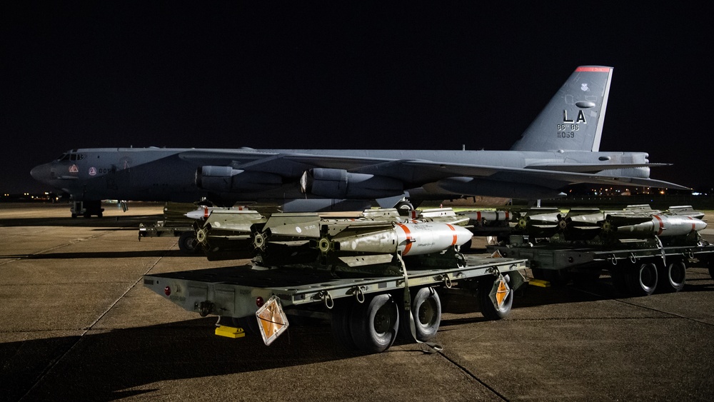 96th AMU Airmen load Navy mines as part of training exercise