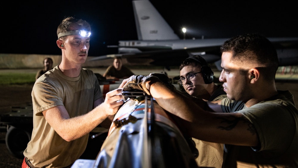 96th AMU Airmen load Navy mines as part of training exercise