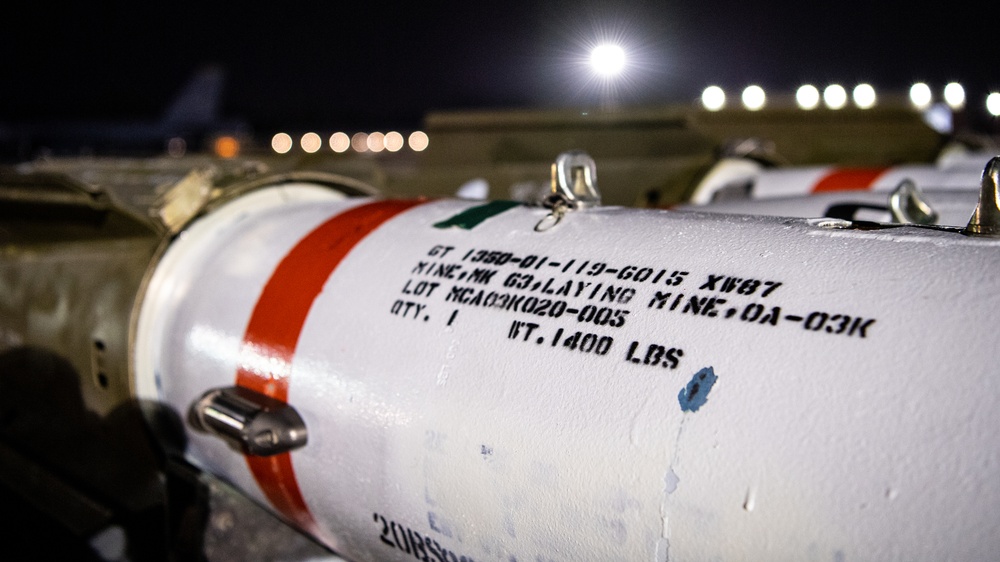 96th AMU Airmen load Navy mines as part of training exercise