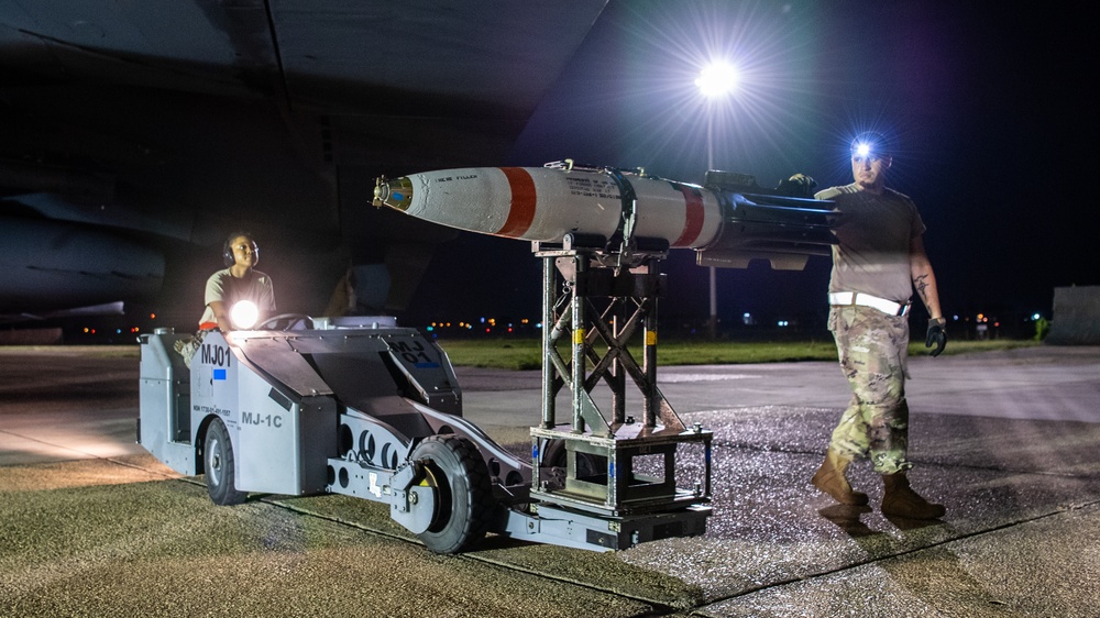 96th AMU Airmen load Navy mines as part of training exercise