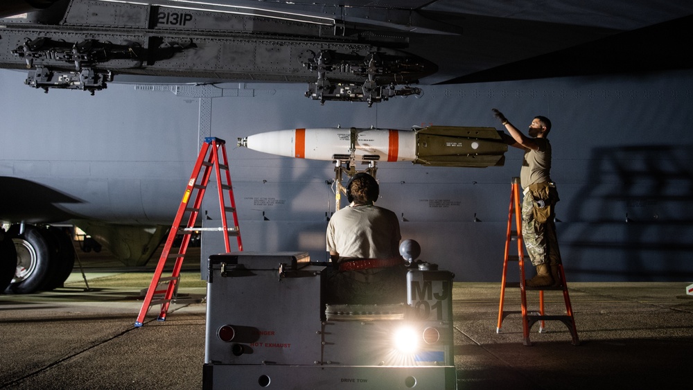 96th AMU Airmen load Navy mines as part of training exercise