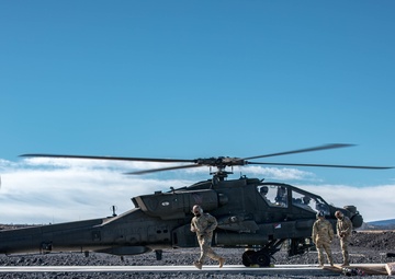 15Y reload AH-64 Apaches during Aerial Gunnery at PTA