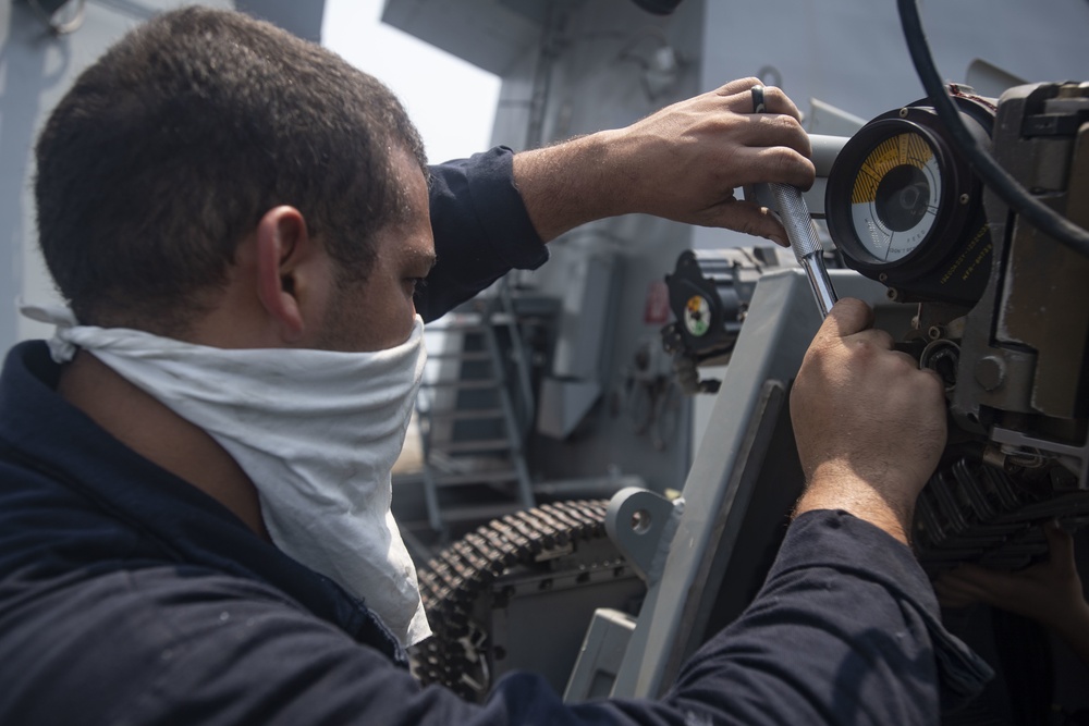 USS Ralph Johnson Sailors Conduct Weapons Maintenance