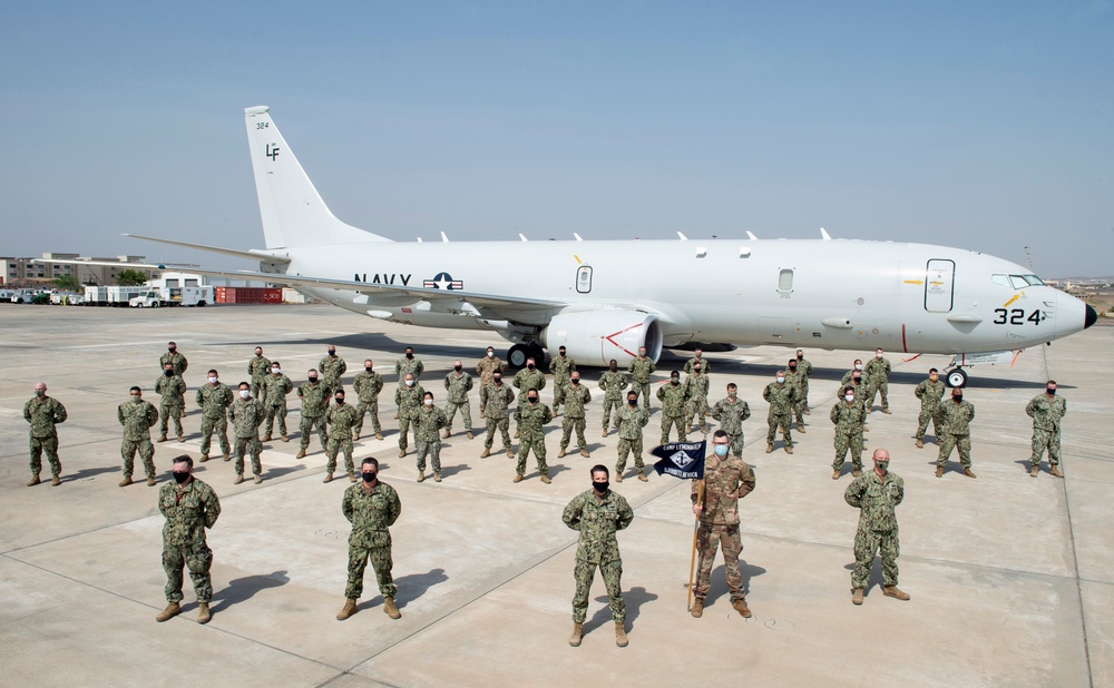 Camp Lemonnier's Department in the Spotlight Poses for Photo