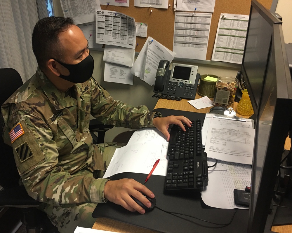 Sgt. First Class Dave Mercado at work for the 340th Military Police Company
