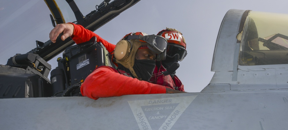 Aviation Ordnancemen Perform Countermeasure And Missile-Alignment Test On Cougars VAQ 139 F/A-18G Growler On Flight Deck Aboard Aircraft Carrier USS Nimitz CVN 68