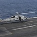 Helicopter Lands On Flight Deck
