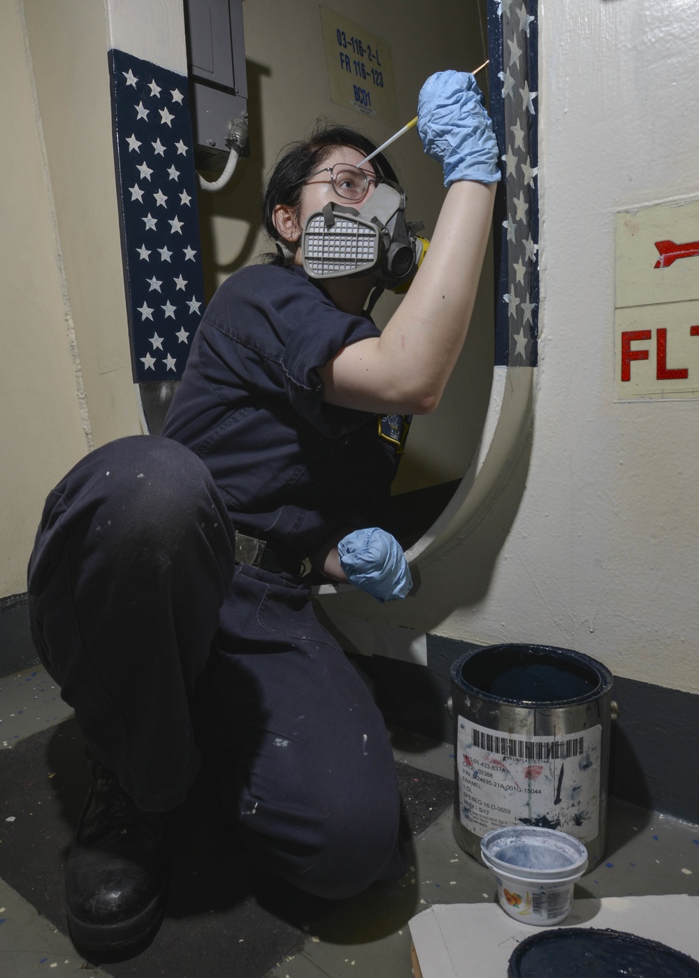 Information Systems Technician Paints Kinfeedge Aboard Aircraft Carrier USS Nimitz CVN 68