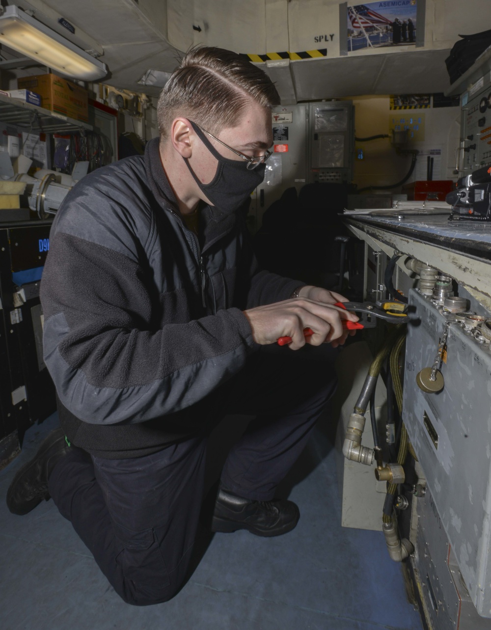 Aviation Electronics Technician Works On E2C Radar Aboard Aircraft Carrier USS Nimitz CVN 68