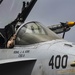 A Pilot Prepares An F/A-18C Hornet For Launch