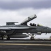 Sailors Taxi An F/A-18E Super Hornet Across The Flight Deck Aboard Nimitz