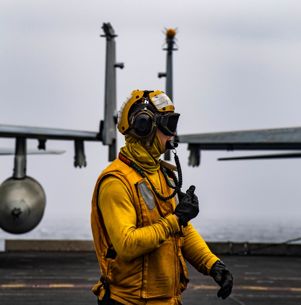 A Sailor Participates In Flight Quarters Aboard Nimitz