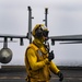 A Sailor Participates In Flight Quarters Aboard Nimitz