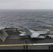 An F/A-18C Hornet and F/A-18E Super Hornetprepare to launch off the flight deck of the aircraft carrier USS Nimitz (CVN 68).