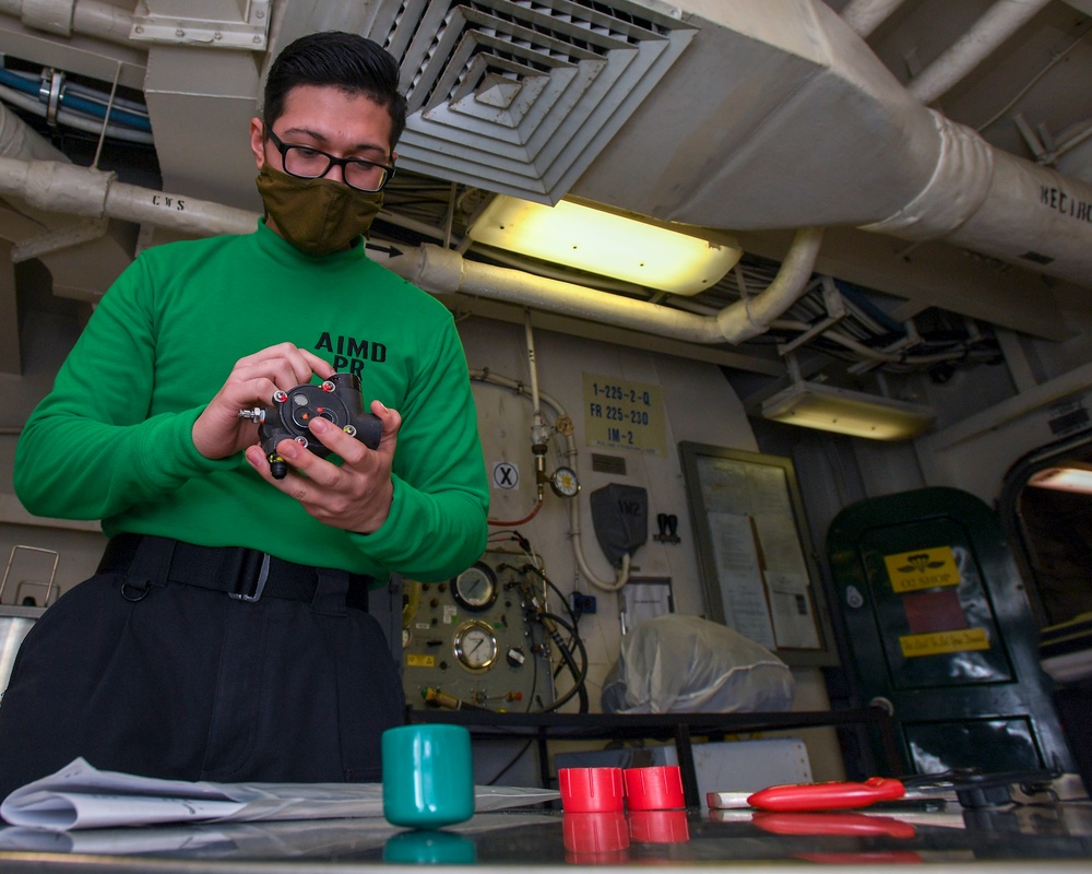 Sailor Inspects CRU-103 A/P