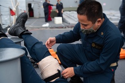 USS Princeton Sailors participate in a mass casualty training drill