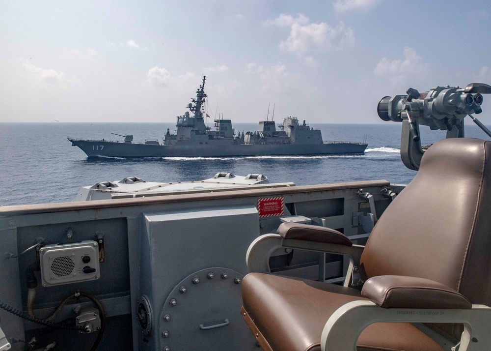 USS Mustin Sails Alongside JS Suzutsuki