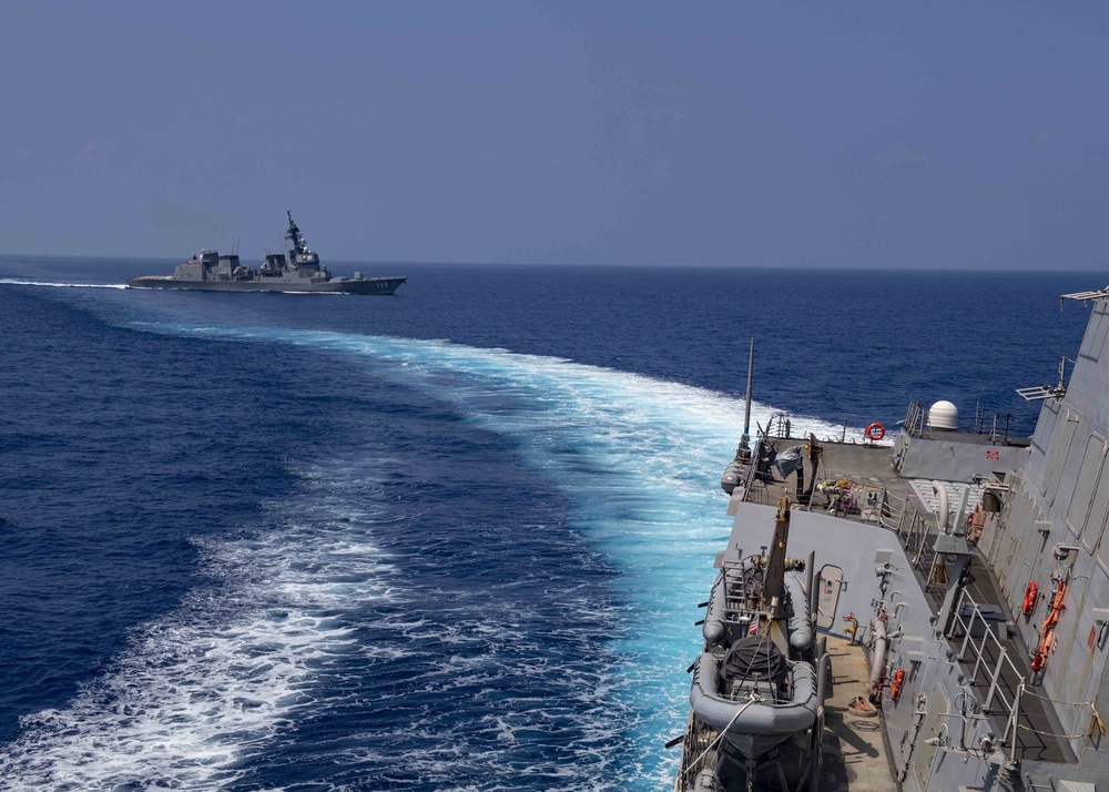 USS Mustin Sails Alongside JS Suzutsuki