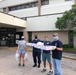 Coast Guard Sector/Air Station Corpus Christi crew members deliver dinners to Corpus Christi Medical Center personnel