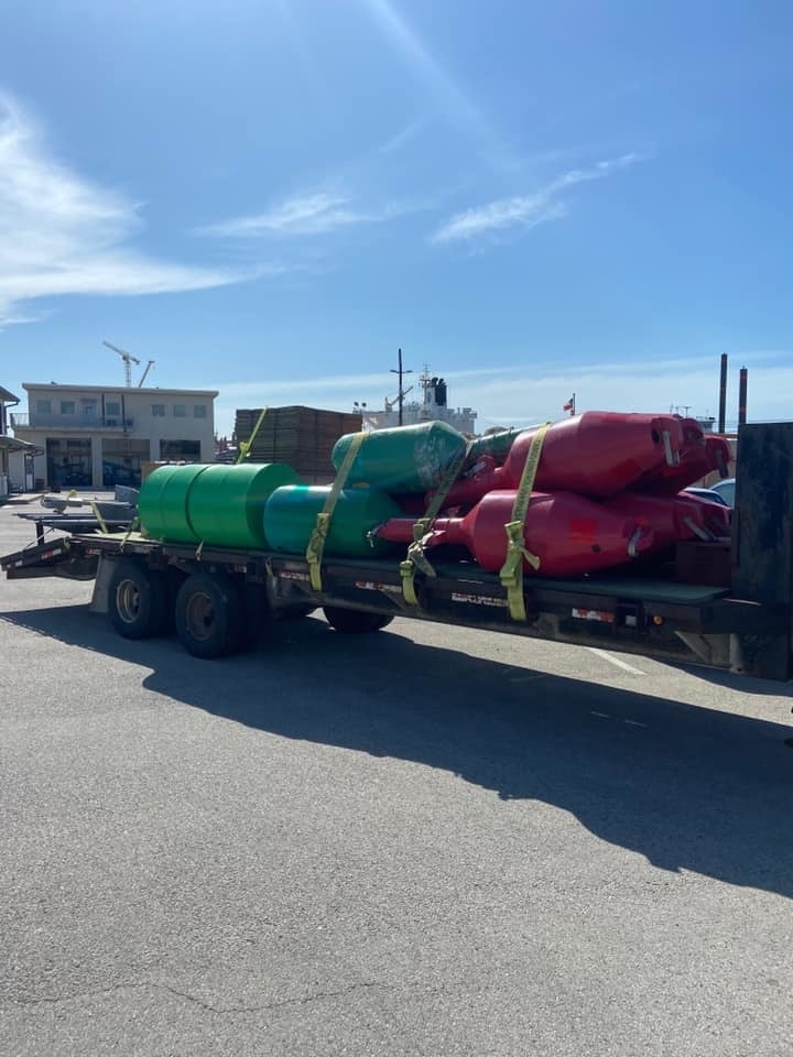 Coast Guard Aids to Navigation Teams repair buoys in Corpus Christi, Texas, following Hurricane Hanna