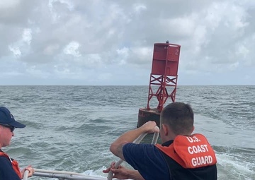 Coast Guard Aids to Navigation Teams repair buoys in Corpus Christi, Texas, following Hurricane Hanna