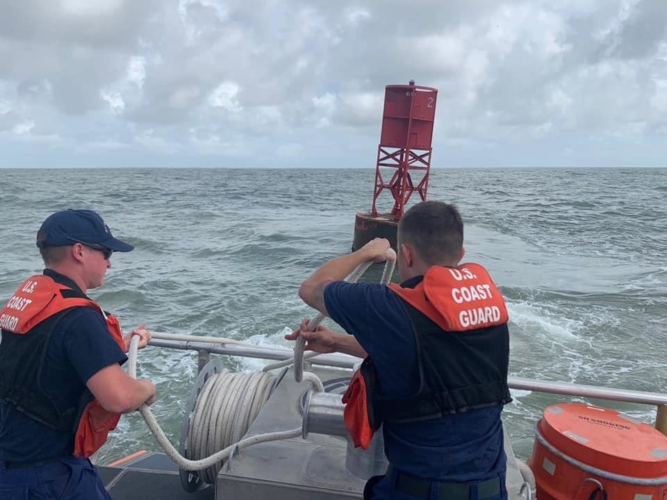 Coast Guard Aids to Navigation Teams repair buoys in Corpus Christi, Texas, following Hurricane Hanna