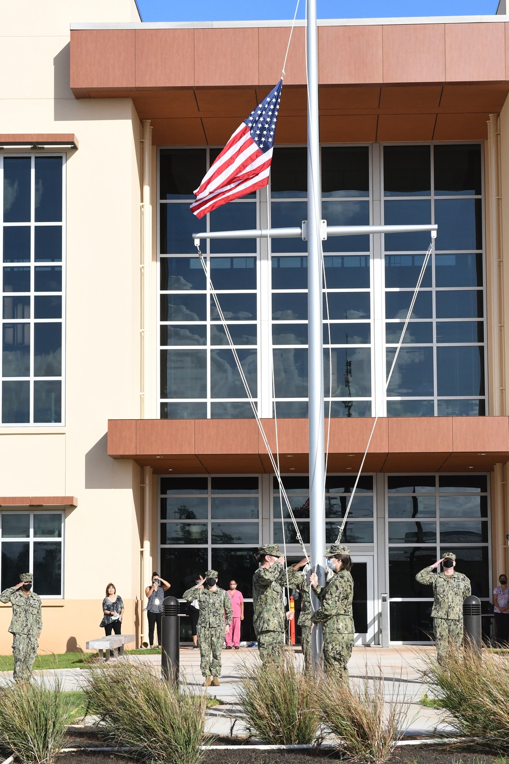 Sailors salute flag raised for the first time at new BHC Kaneohe Bay facility