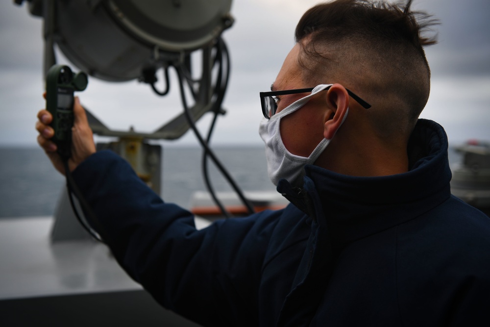 USS Thomas Hudner (DDG 116) Participates in a Replenishment-at-Sea With MV Asterix During Nanook 2020