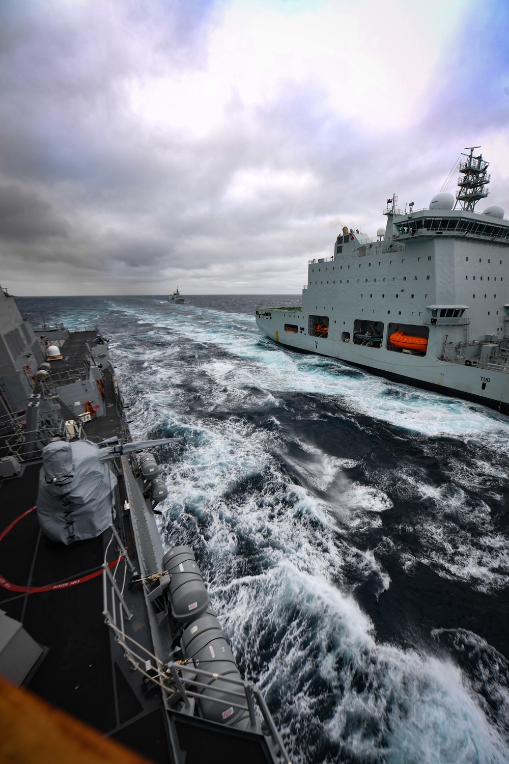 USS Thomas Hudner (DDG 116) Participates in a Replenishment-at-Sea With MV Asterix During Nanook 2020