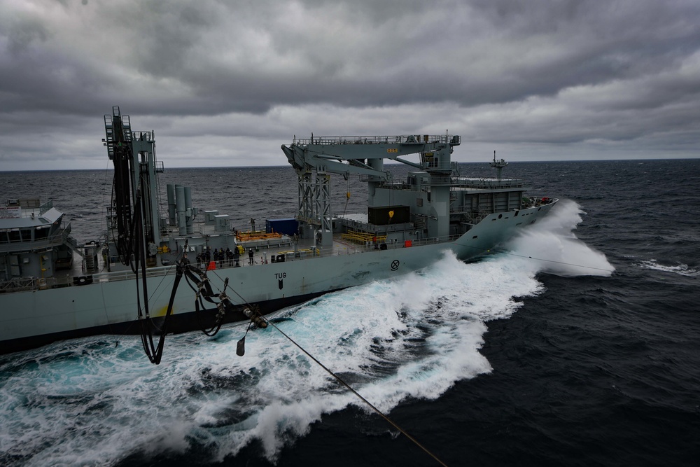 USS Thomas Hudner (DDG 116) Participates in a Replenishment-at-Sea With MV Asterix During Nanook 2020