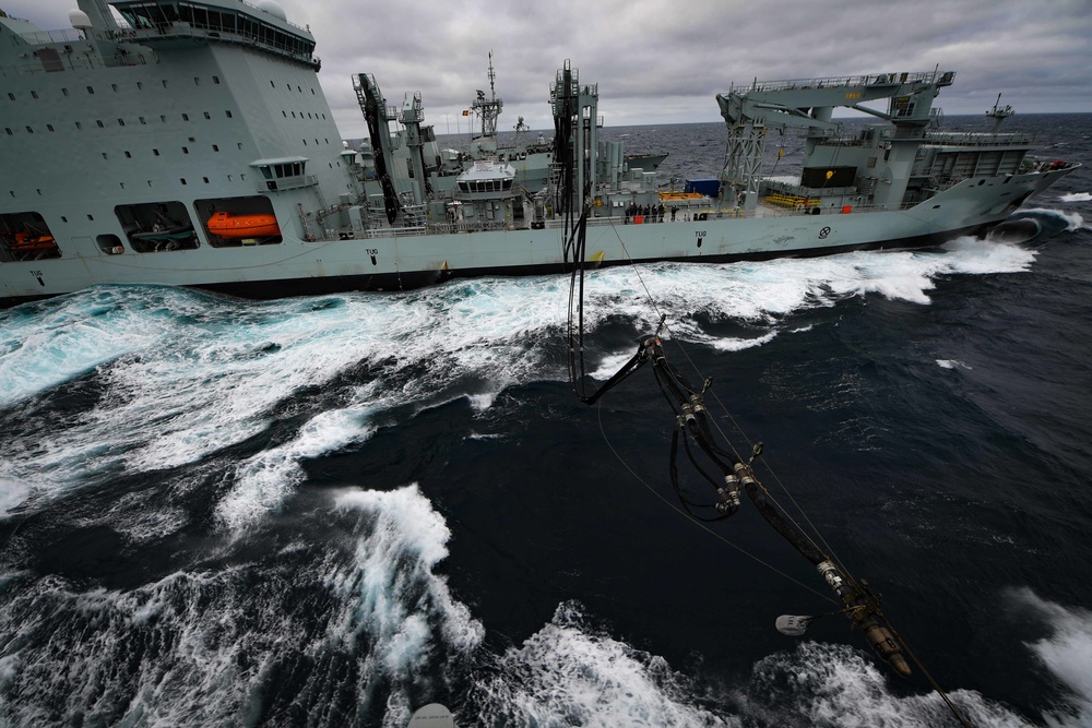 USS Thomas Hudner (DDG 116) Participates in a Replenishment-at-Sea With MV Asterix During Nanook 2020