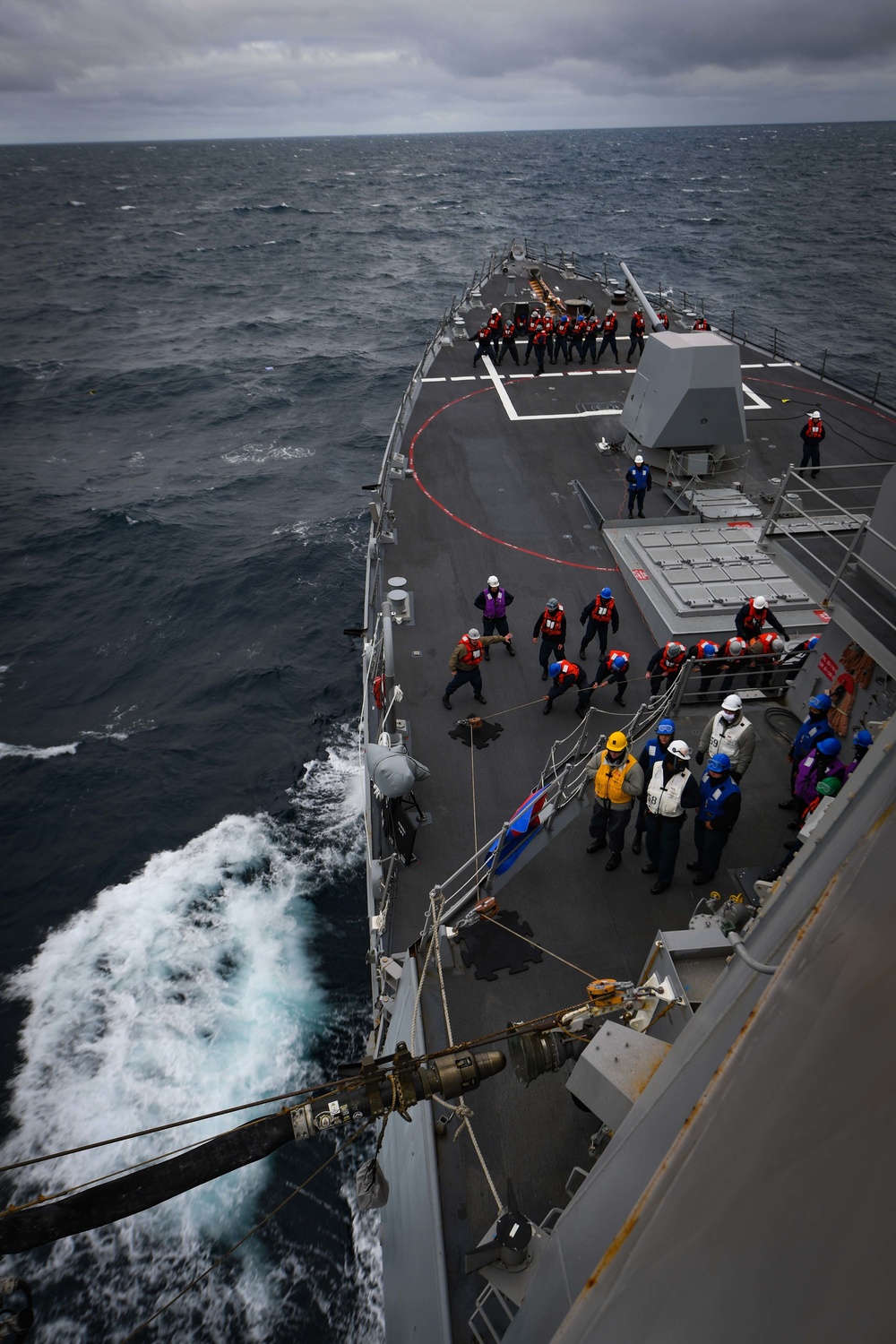 USS Thomas Hudner (DDG 116) Participates in a Replenishment-at-Sea With MV Asterix During Nanook 2020