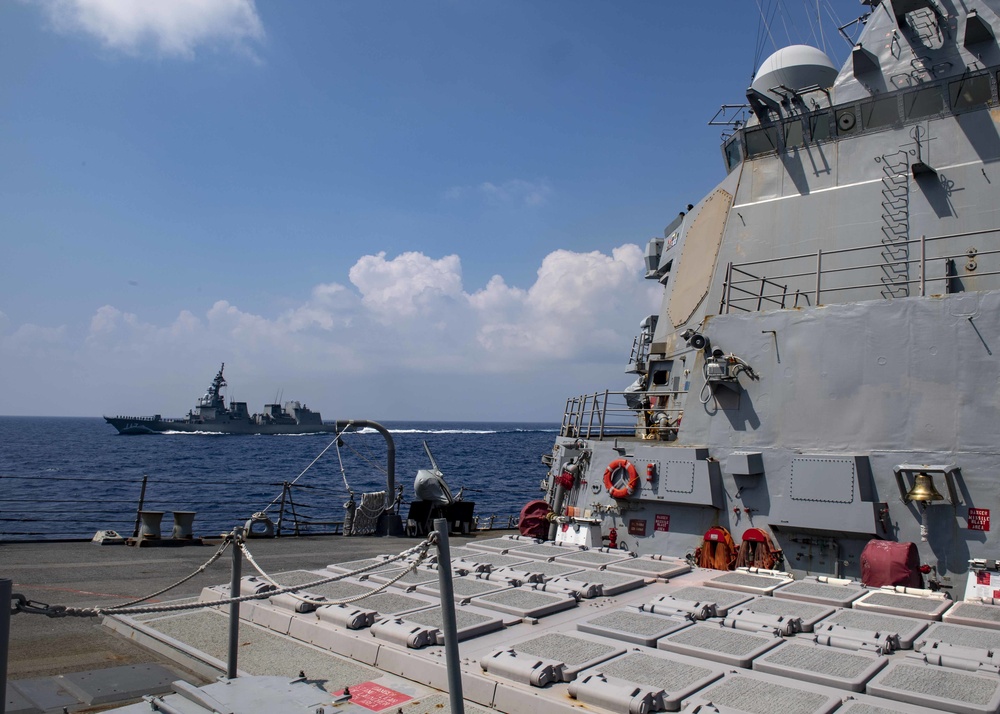 USS Mustin Sails Alongside JS Suzutsuki