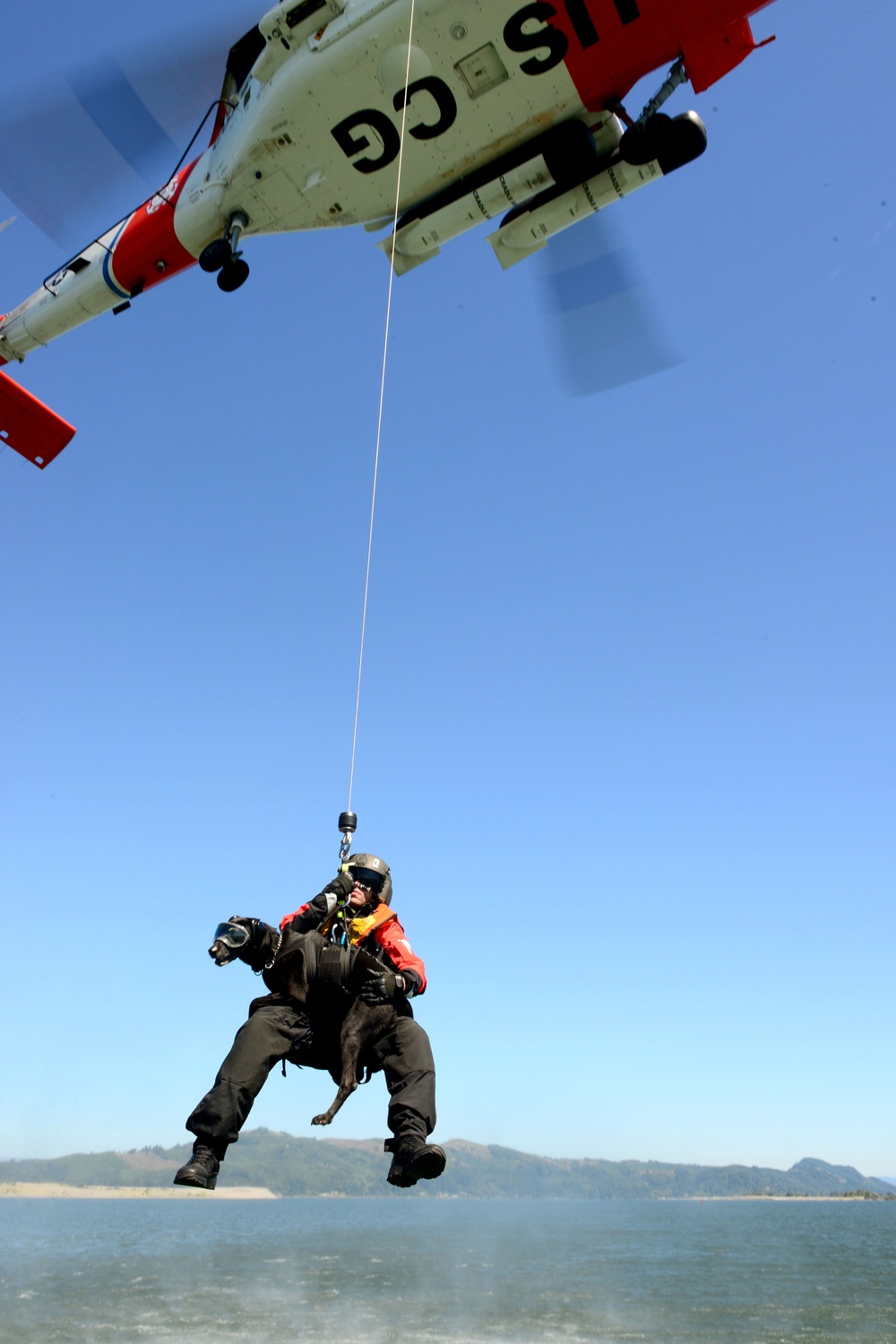 Coast Guard Canine Explosive Detection Team trains on Columbia River, OR