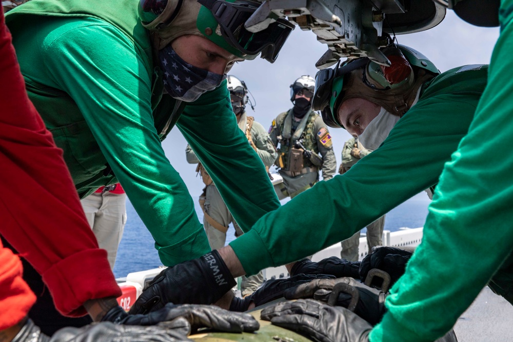 USS America (LHA 6) Conducts Missile Onload