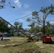 Bent power pole