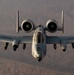 A U.S. Air Force KC-135 Stratotanker refuels A-10 Thunderbolts.