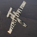 A U.S. Air Force KC-135 Stratotanker refuels A-10 Thunderbolts.