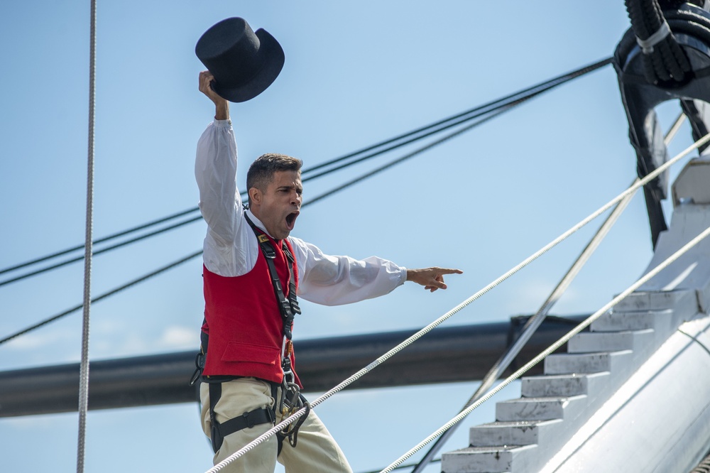 Command Senior Chief Jans Valdespou participates in a reenactment of USS Constitution’s victorious battle