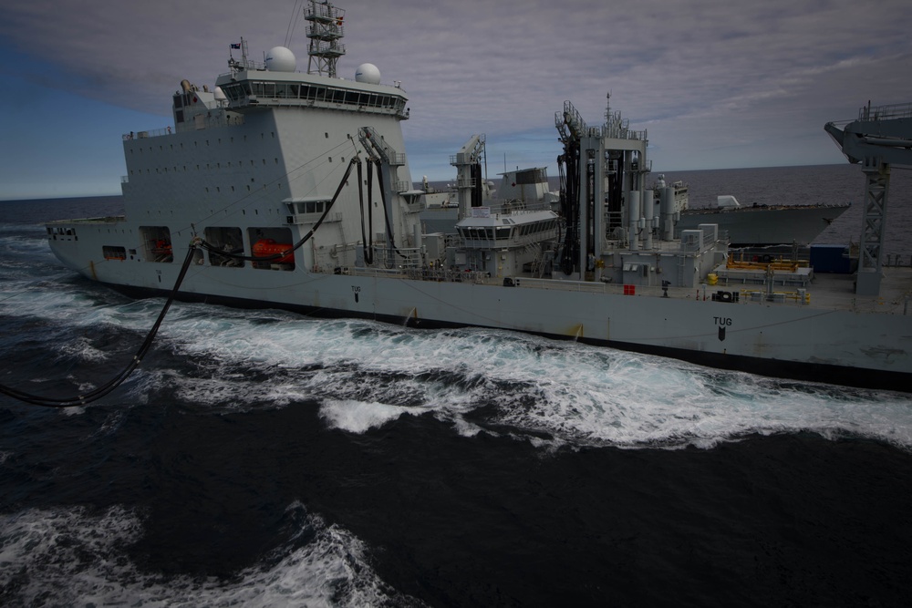 USS Thomas Hudner (DDG 116) Participates in Replenishment-at-Sea with Royal Canadian Ship MV Asterix and Royal Canadian Navy Halifax-class frigate HMCS Ville de Québec (FFH 332) During Operation Nanook